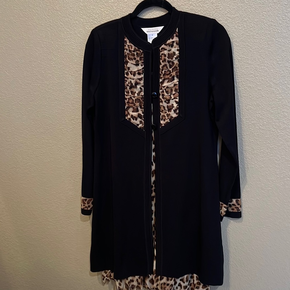 Mistook sweater jacket with leopard trim and matching leopard skirt.
